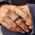 White gold wedding band with emerald cut moissanite, perfect for elegant and minimalist styling.