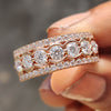 Moissanite half eternity band featuring round stones set halfway for daily comfort and subtle brilliance.