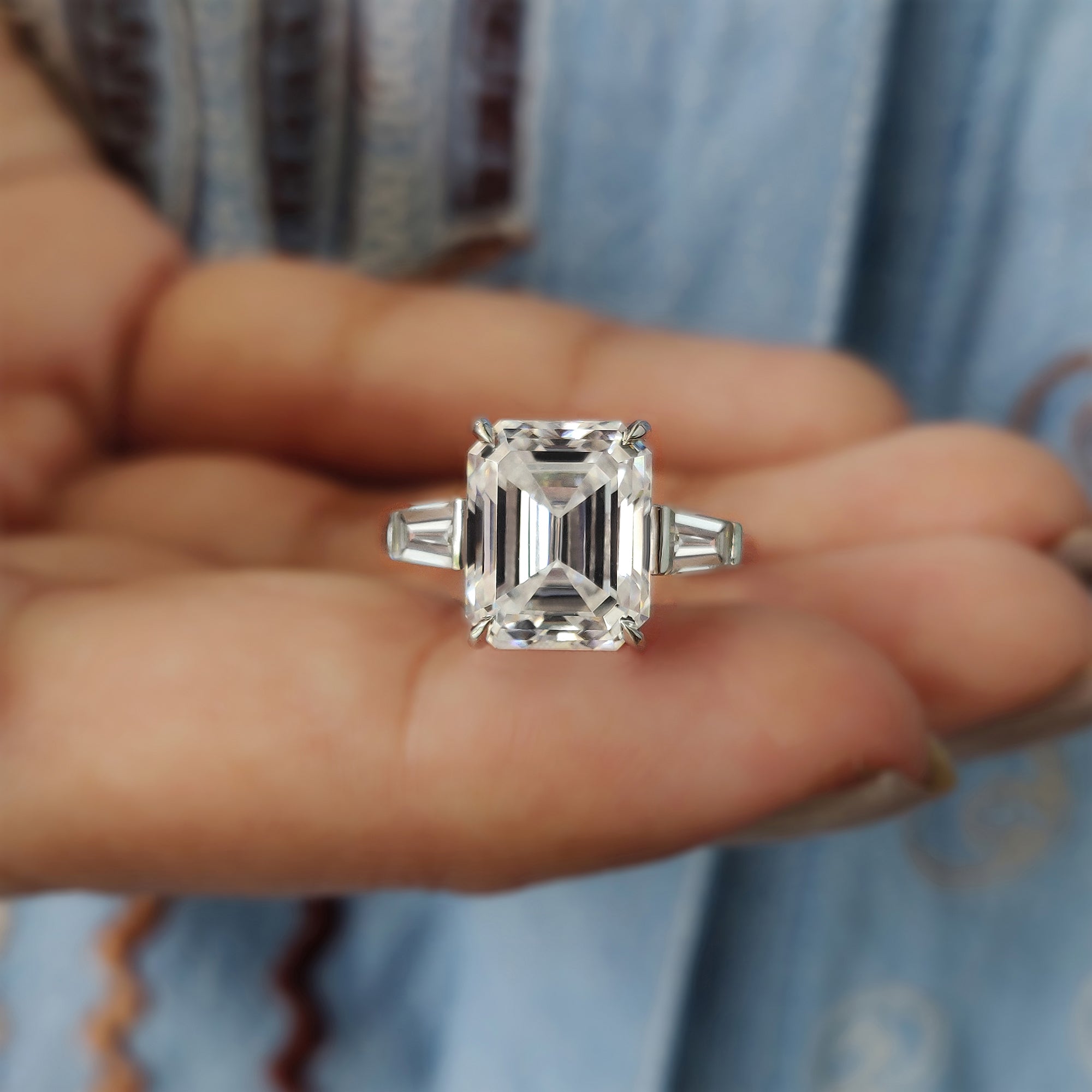 This emerald cut moissanite ring offers sleek, elegant lines and brilliant sparkle.