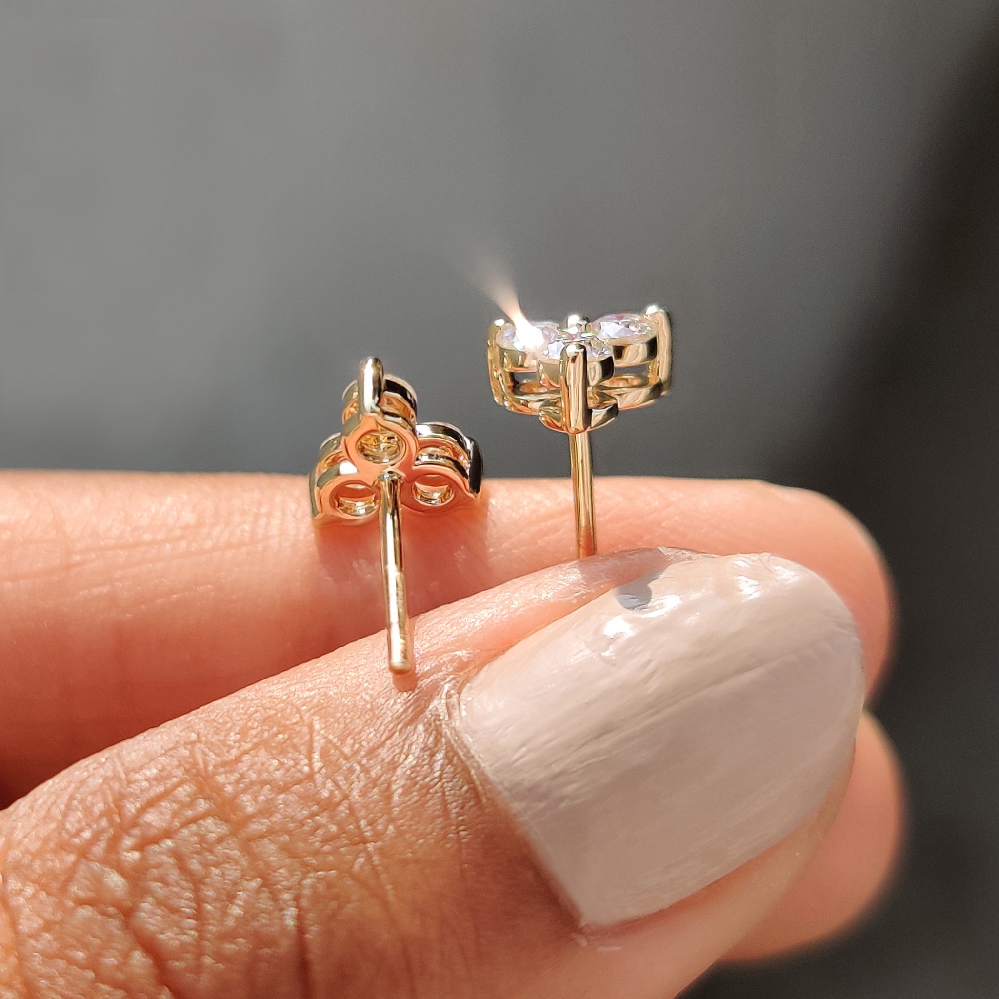 Earrings designed with round cut Moissanite and push back earrings in a handmade earrings finish.
