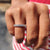 Round cut wedding band made with smooth edges.