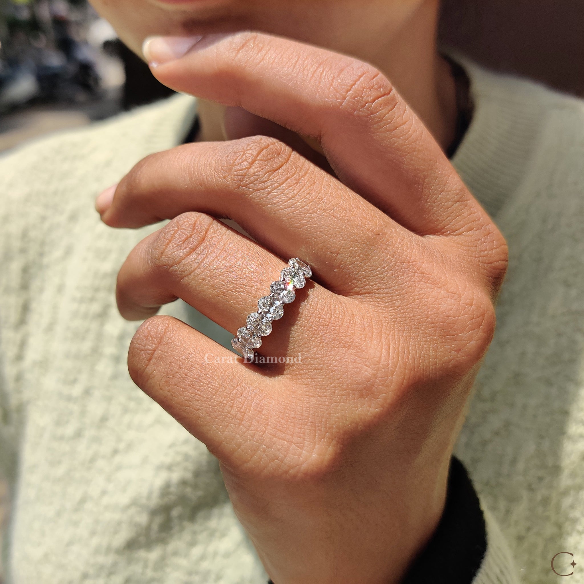 Prong set wedding band handcrafted with precision.
