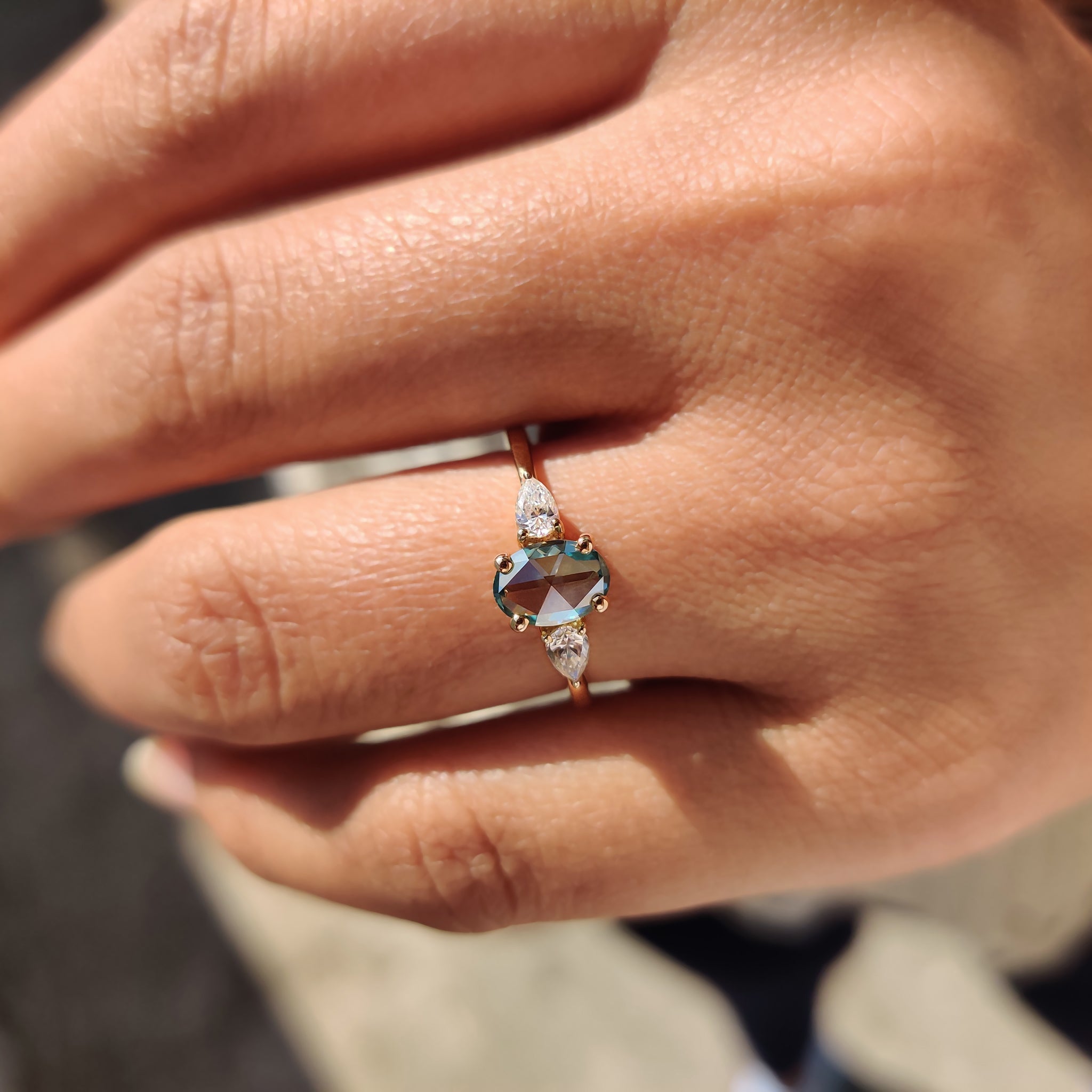 Unique cyan blue oval rose cut engagement ring