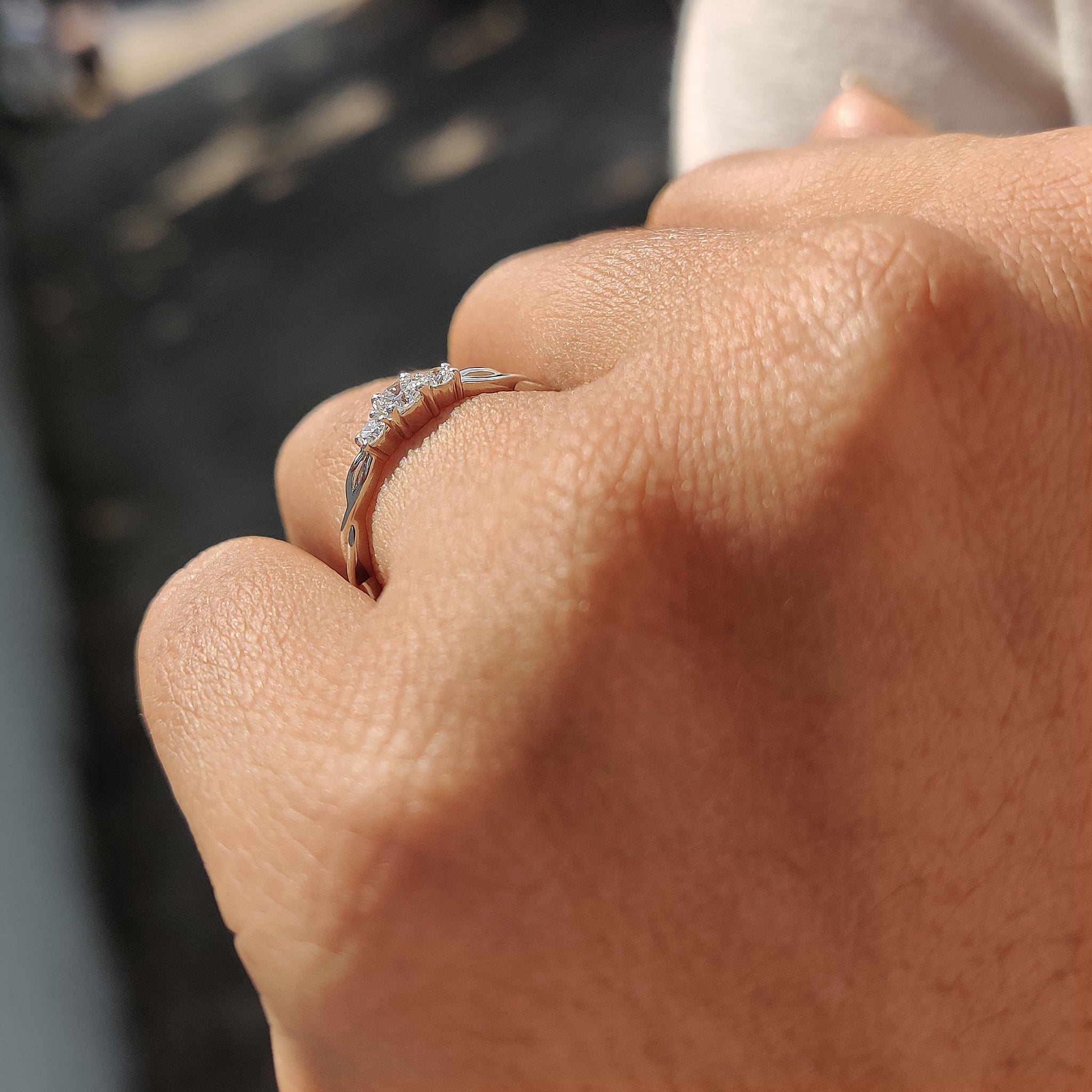 Prong setting ring holding a brilliant diamond securely.
