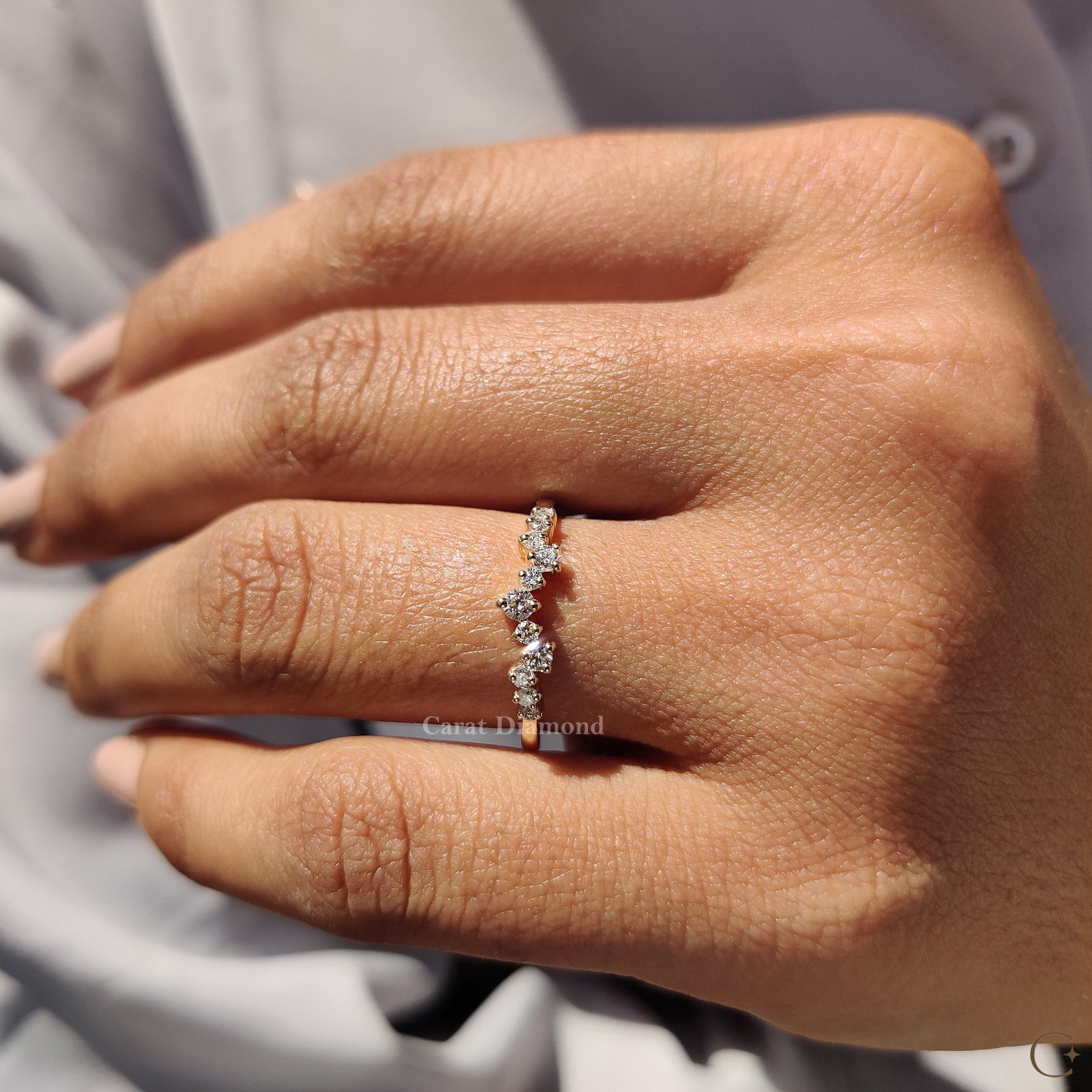 Carat diamonds band shown with a matching stackable wedding band.
