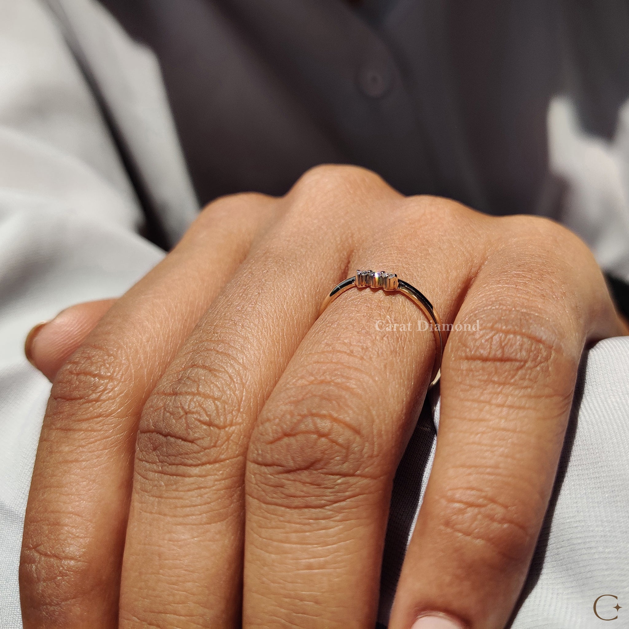 Yellow gold diamond band with elegant design.
