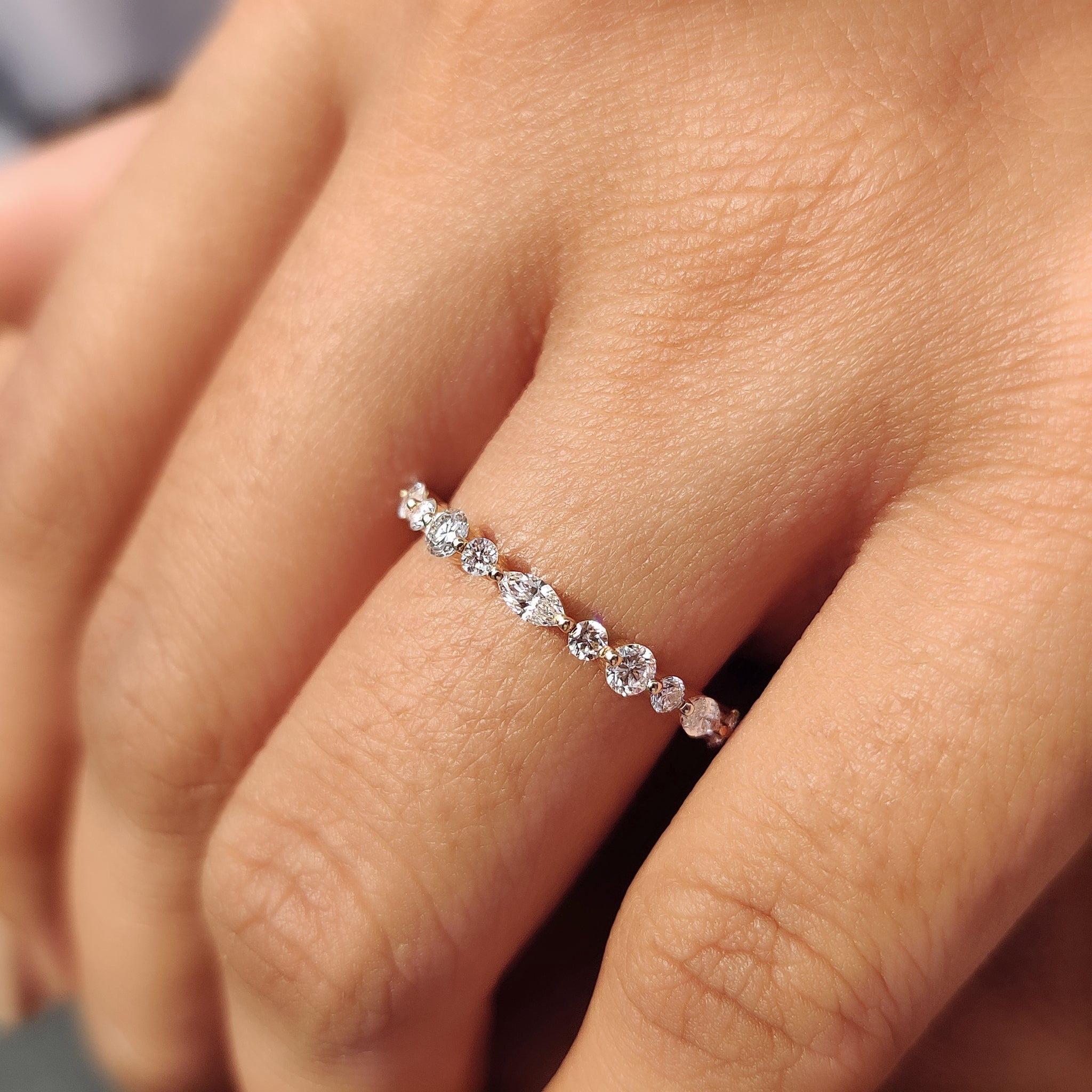 Custom wedding band designed with IGI certified diamonds.