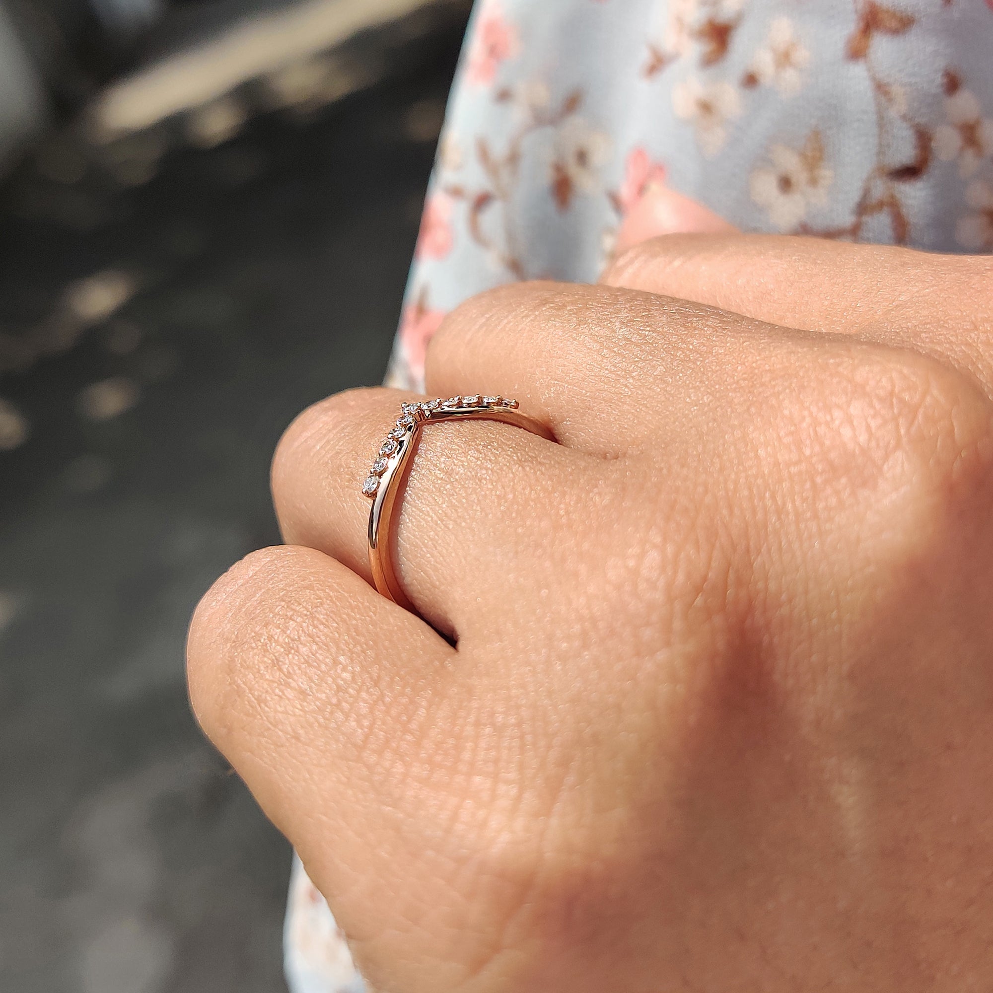 Moissanite wedding band with a V shape, ideal for stacking or matching with solitaires.