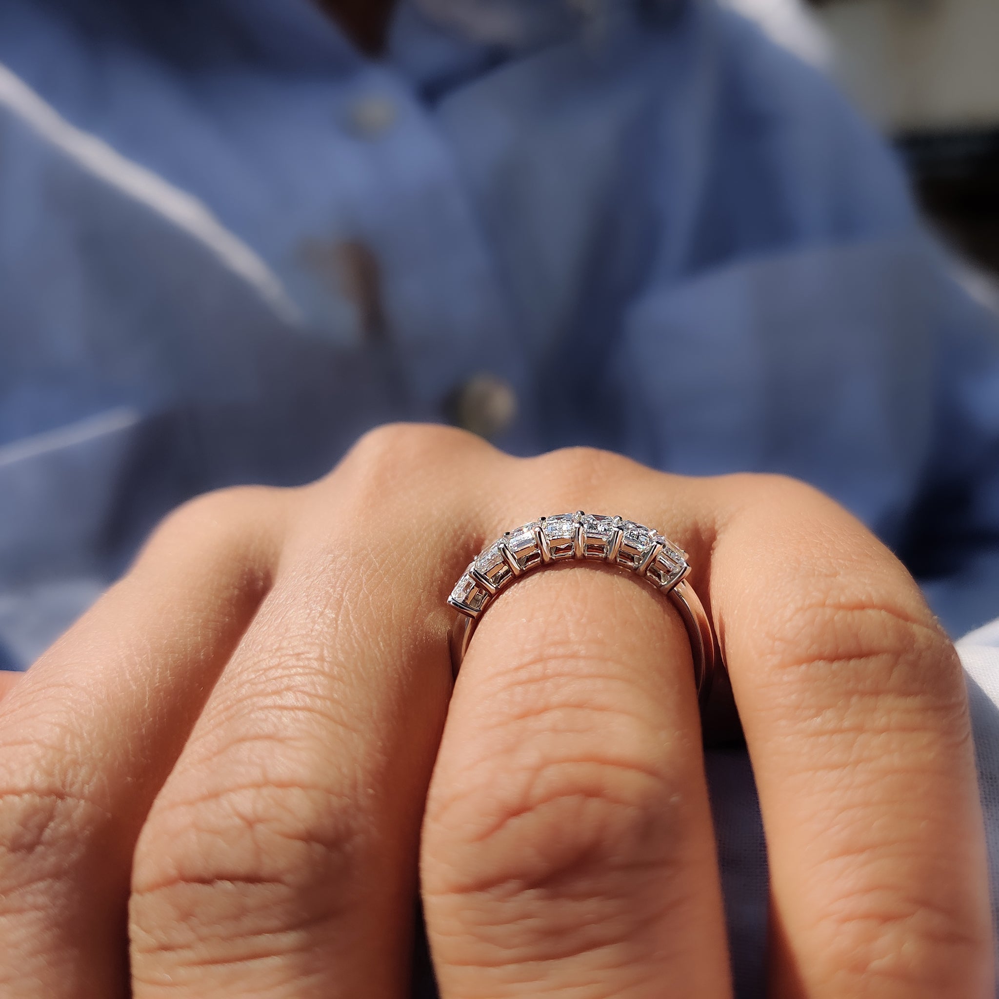 Buy a timeless wedding band featuring emerald cut lab-grown diamonds.
