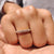 Round Wedding Band displayed on a velvet ring box.

