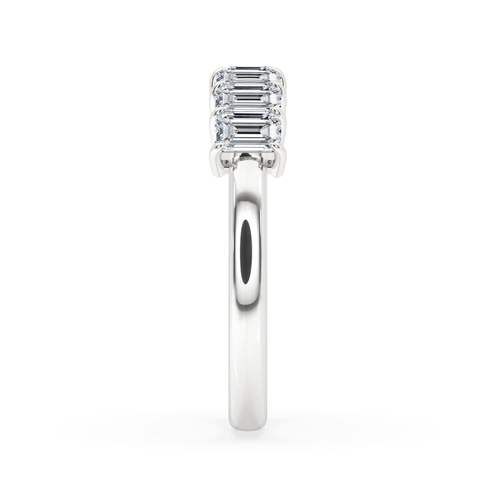 Radiant emerald band crafted with exquisite emerald cut diamonds, perfect for any occasion.