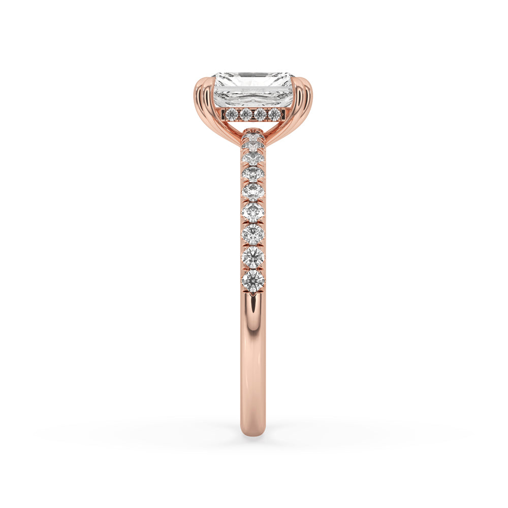 Radiant diamond engagement ring with pave band – A radiant diamond engagement ring with a beautiful pave band, exuding modern elegance.

