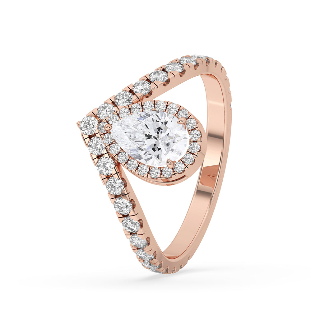 Pear shaped diamond ring with halo, crafted with IGI certified Lab Grown Diamond for an ethical choice.