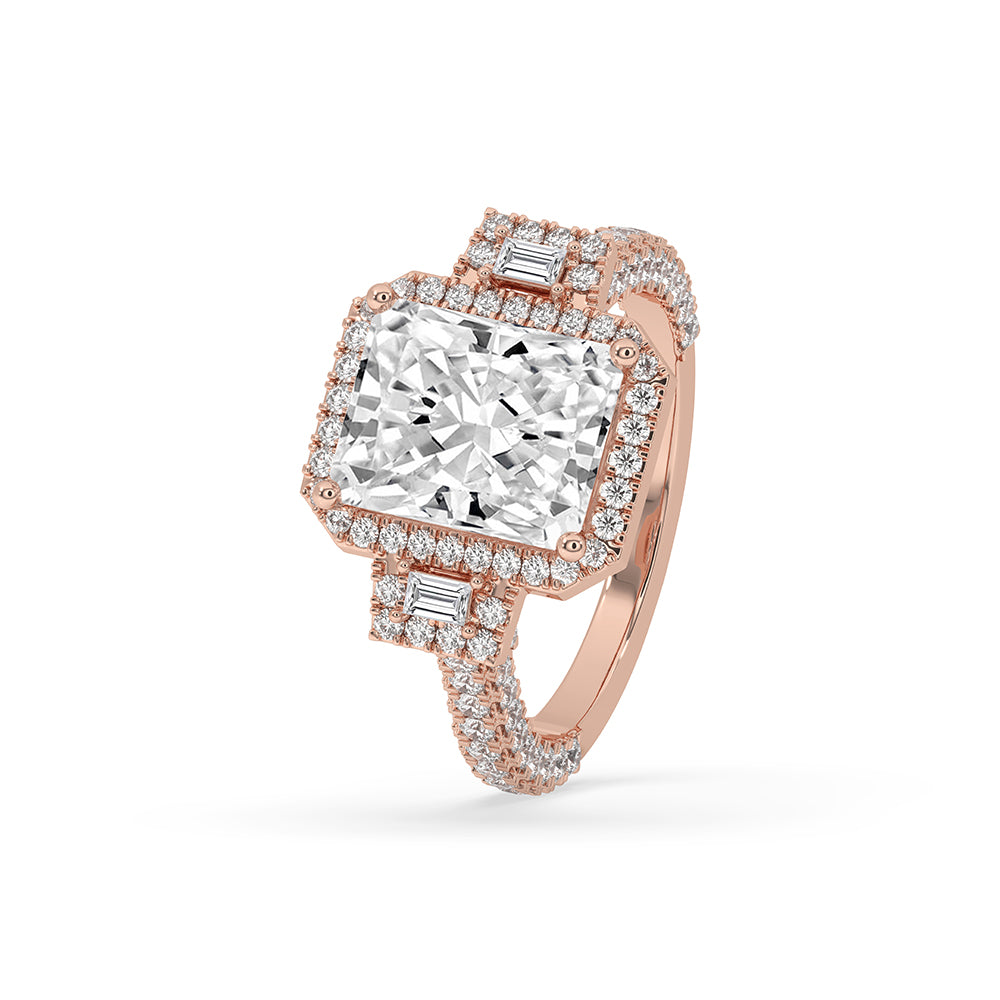 Rose gold diamond ring showcasing a radiant cut ring with prong setting ring details.
