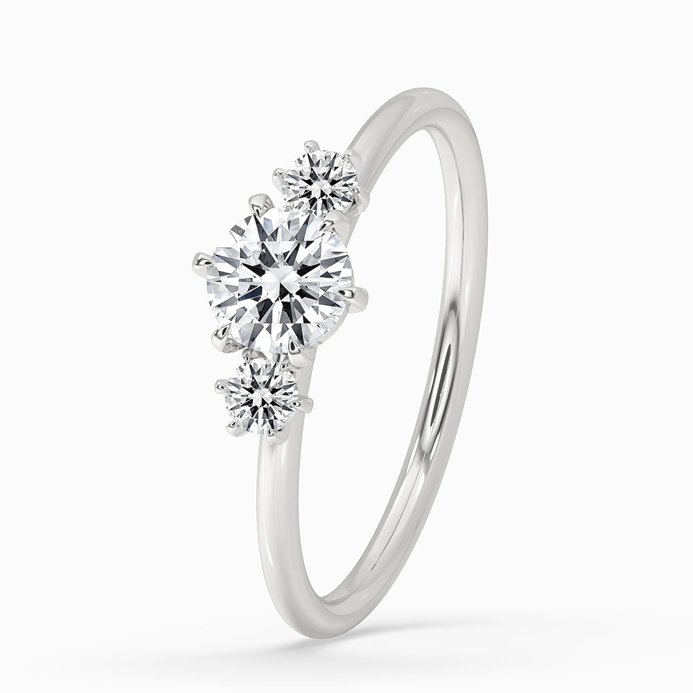 Buy engagement ring featuring round cut diamonds set in prong setting.
