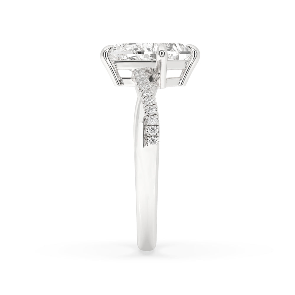 IGI certified handmade jewelry showcasing a kite cut diamond engagement ring with a secure 4 prong setting.
