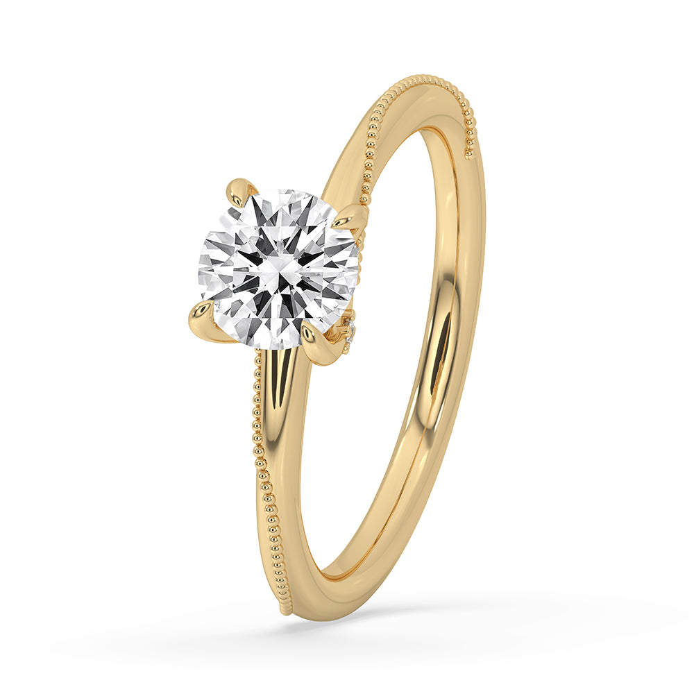 Twisted prong setting ring in yellow gold, perfect for an engagement.
