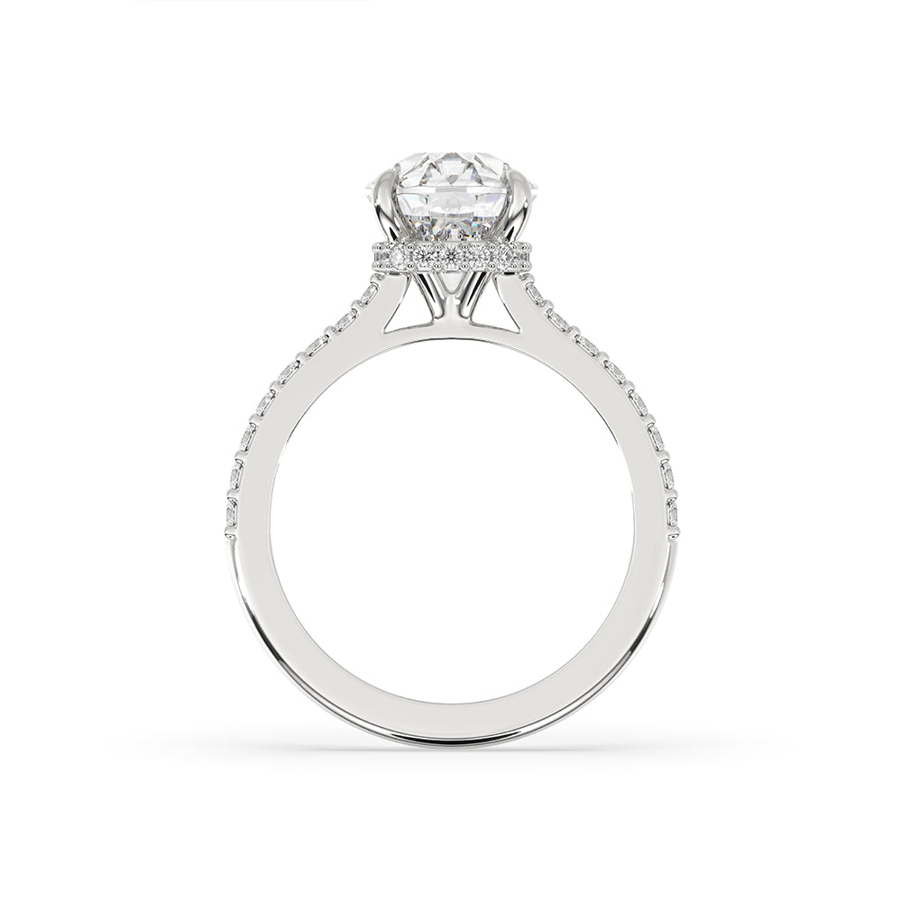 Pave diamond ring featuring a round cut pave band for extra brilliance.
