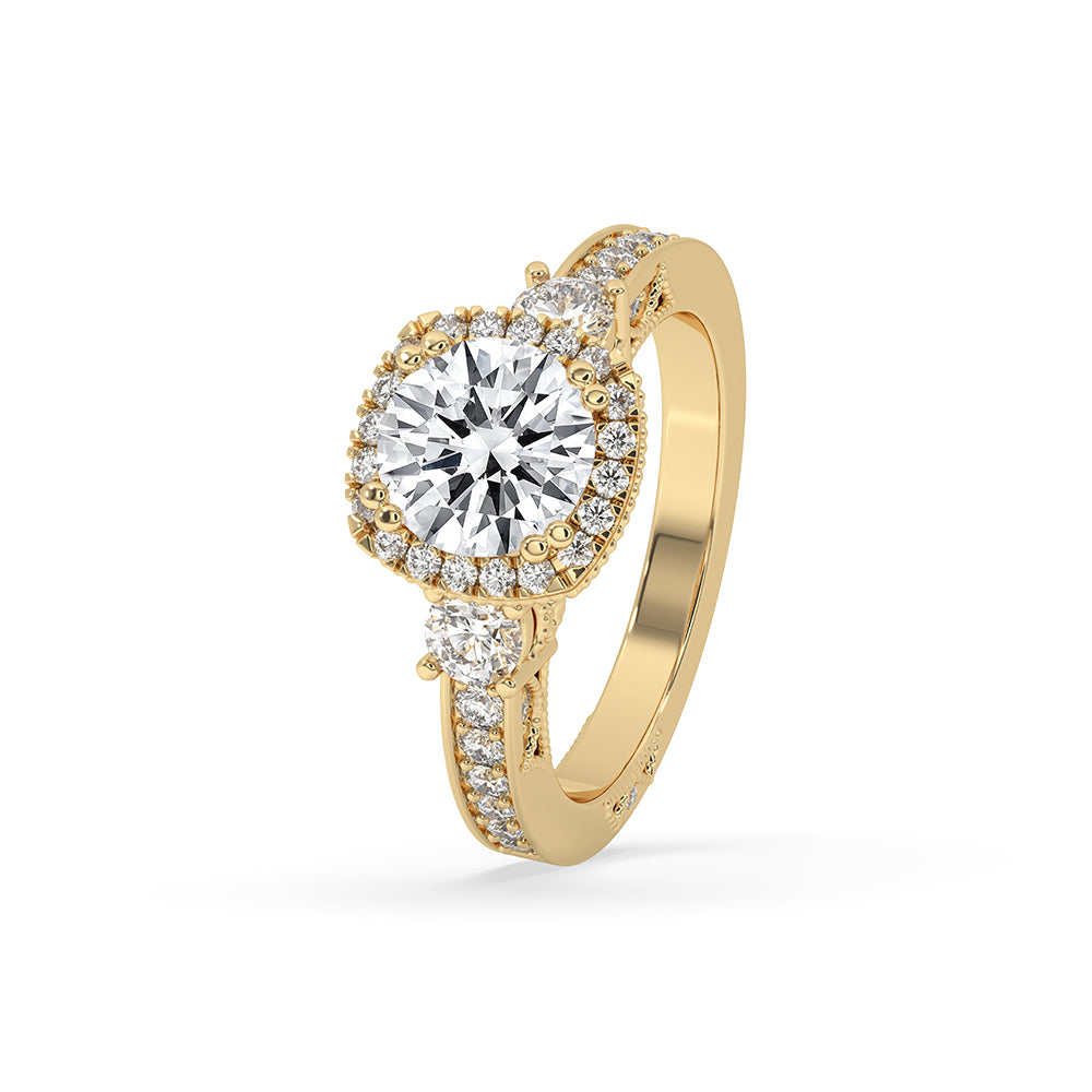 Art deco diamond ring with side stones and prong setting.
