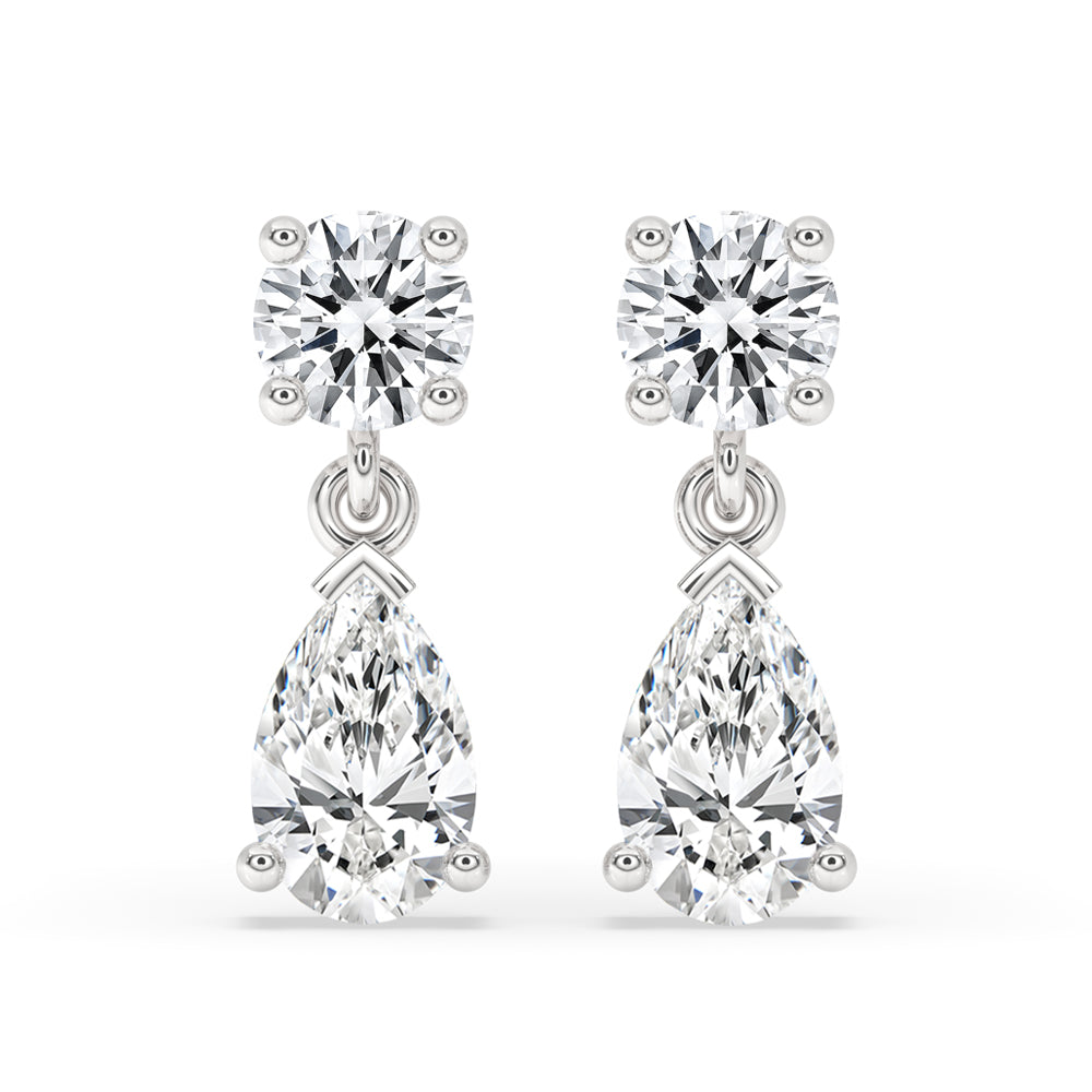 White Gold Drop Earrings with pear and round cut diamond.
