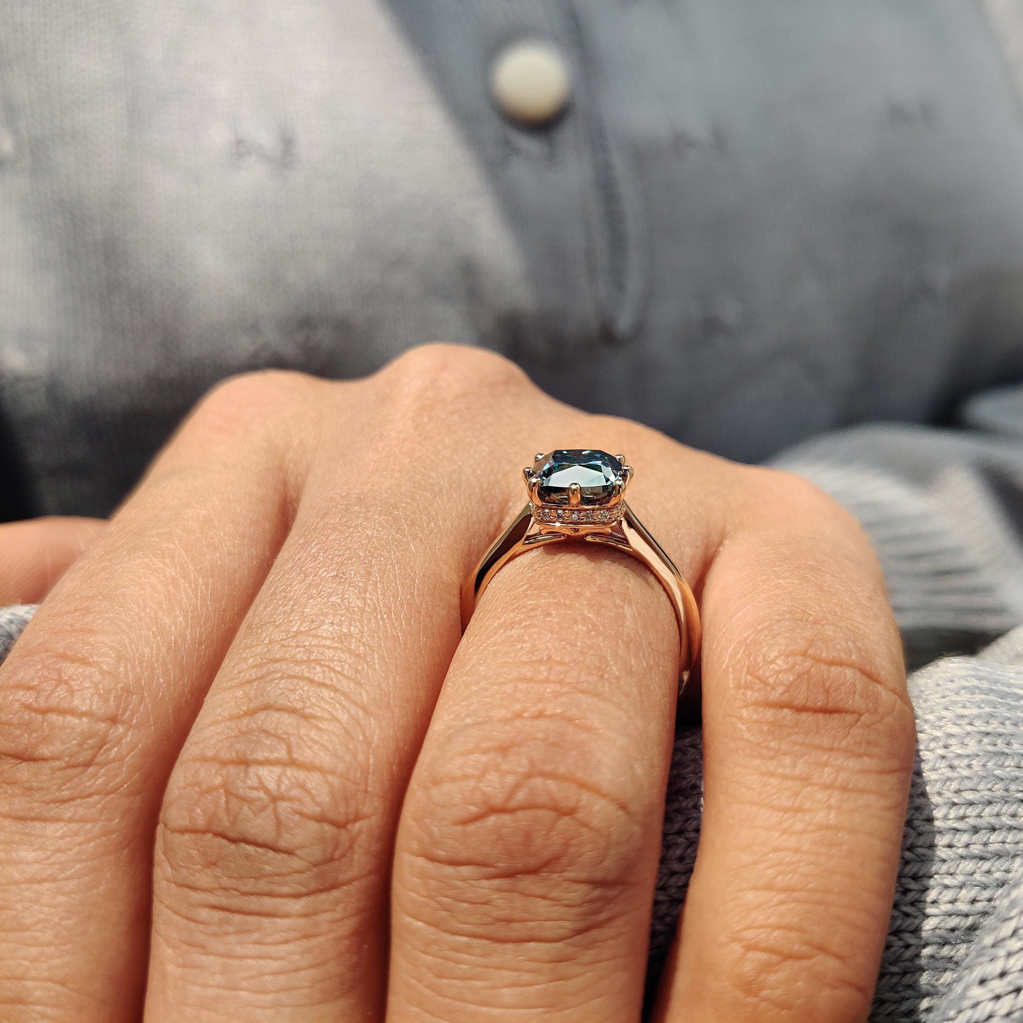 Tapered band narrows smoothly to lift the center stone.