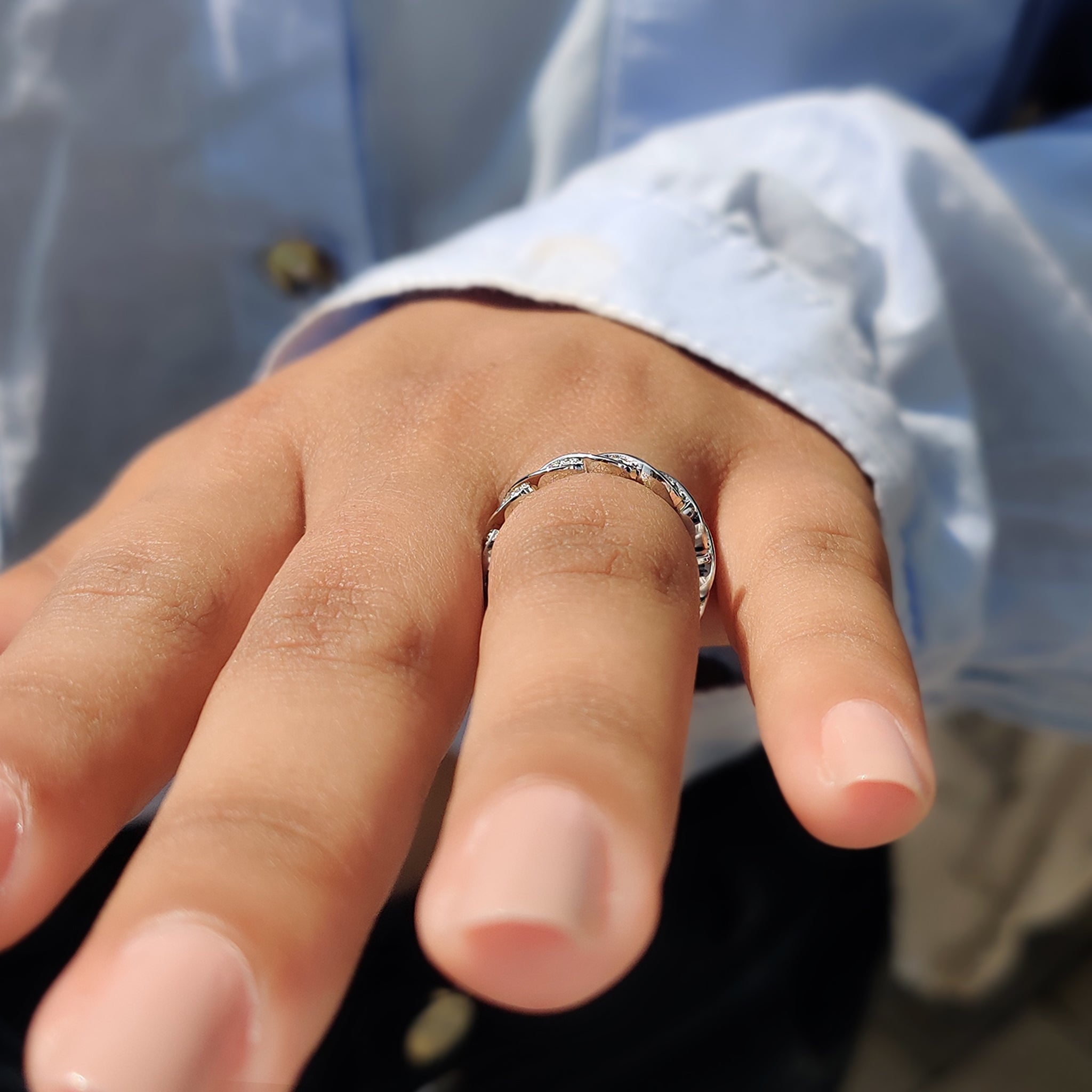 Elegant white gold twisted band for engagement.
