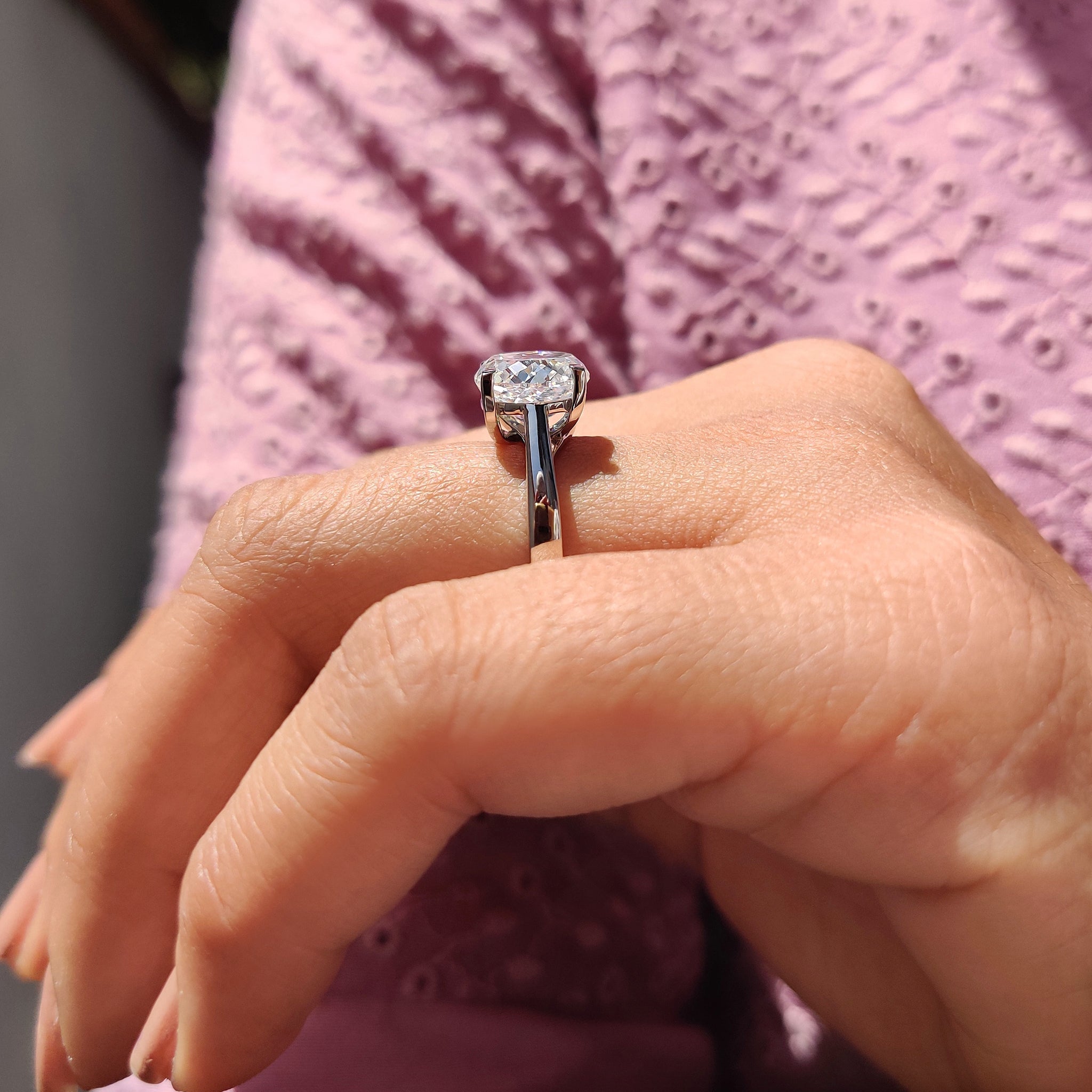 White gold engagement ring adds sleek polished beauty.