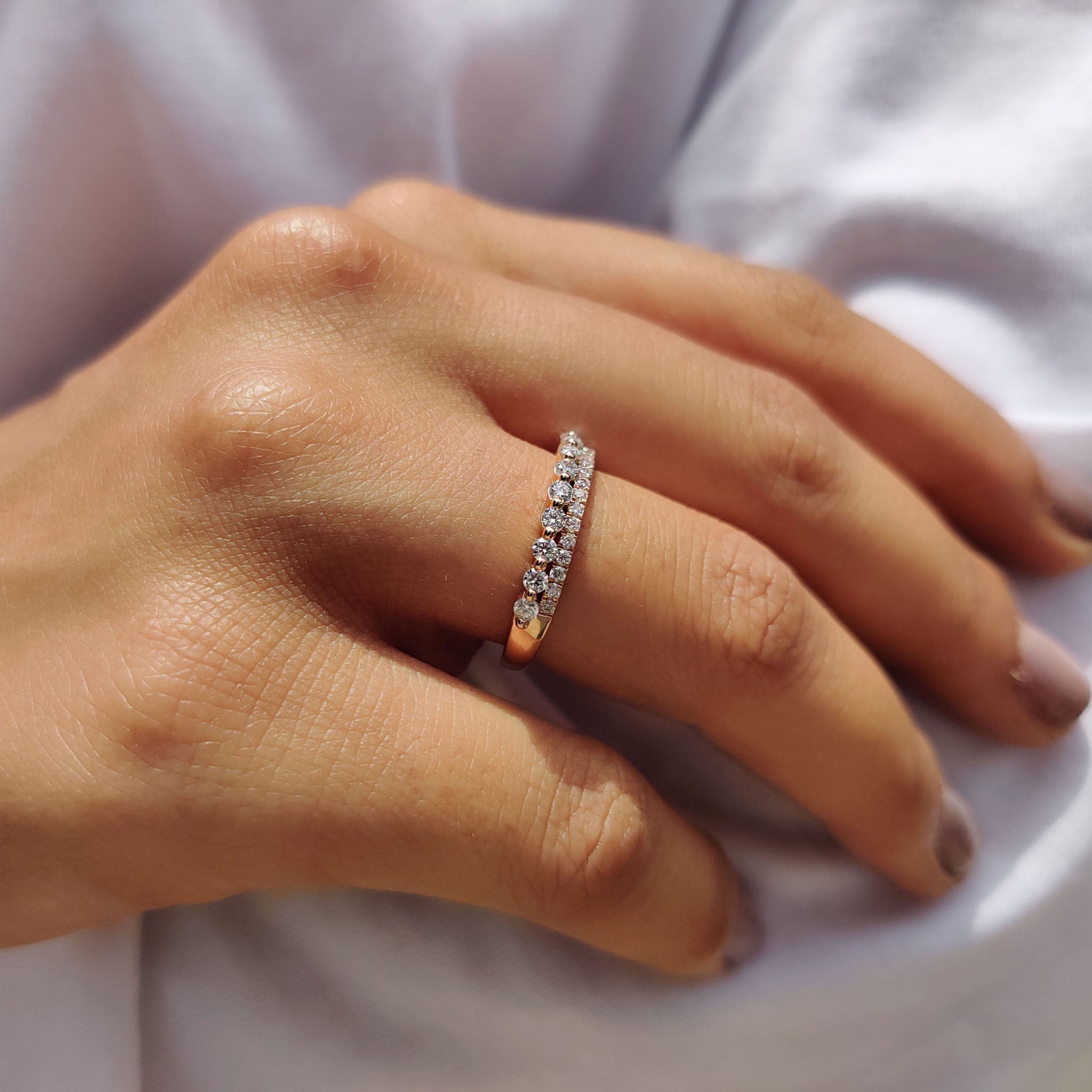 Rose gold wedding band brings soft color.