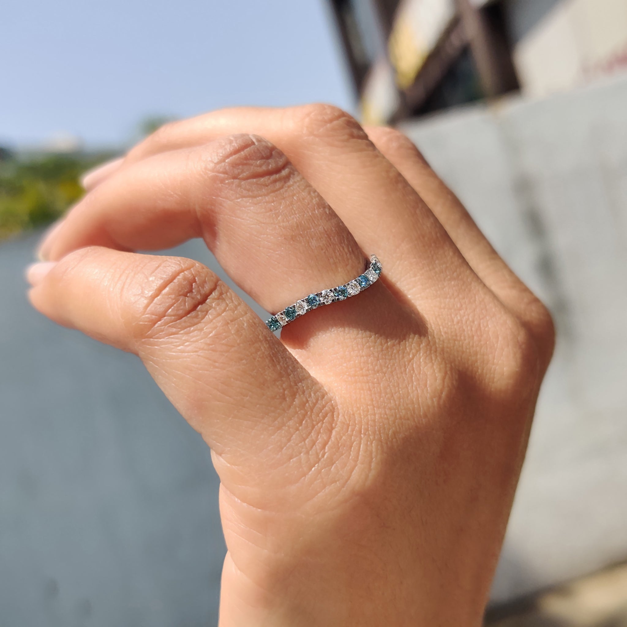 Moissanite wedding band featuring a unique design and high-quality stones.