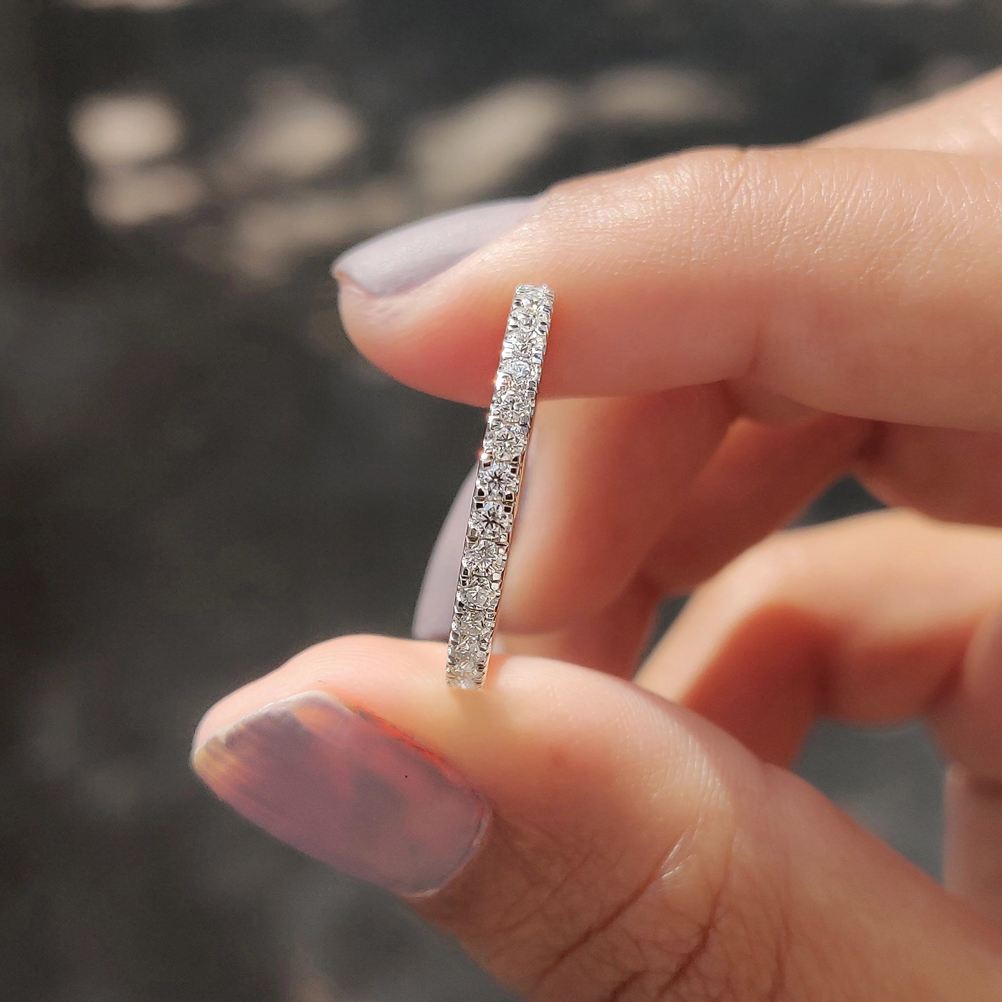 Custom wedding band features handmade jewelry.
