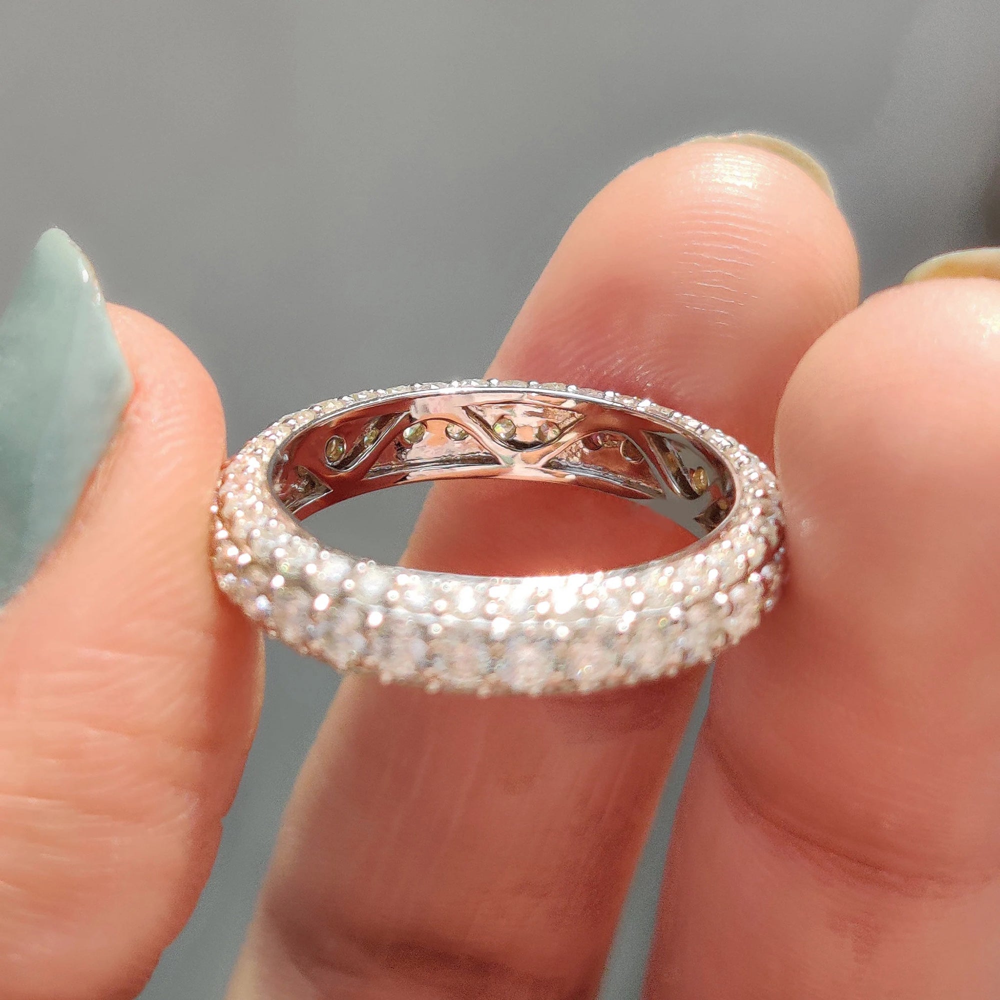 Antique Moissanite band brings a traditional style.
