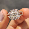 Cushion Cut  ring with a halo setting in rose gold, perfect as a custom engagement ring for a memorable proposal.
