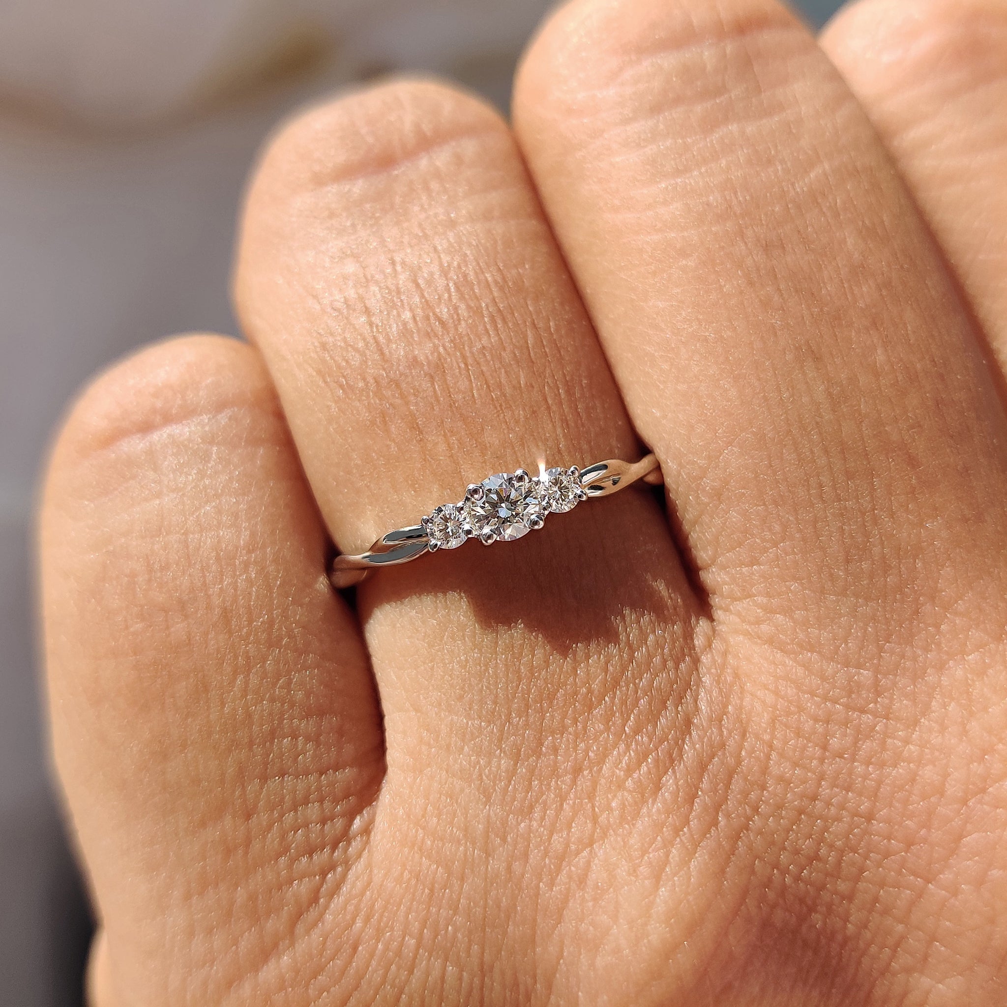 3 stone diamond ring with sparkling lab-grown diamonds.
