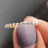 Full eternity band with stones all around.