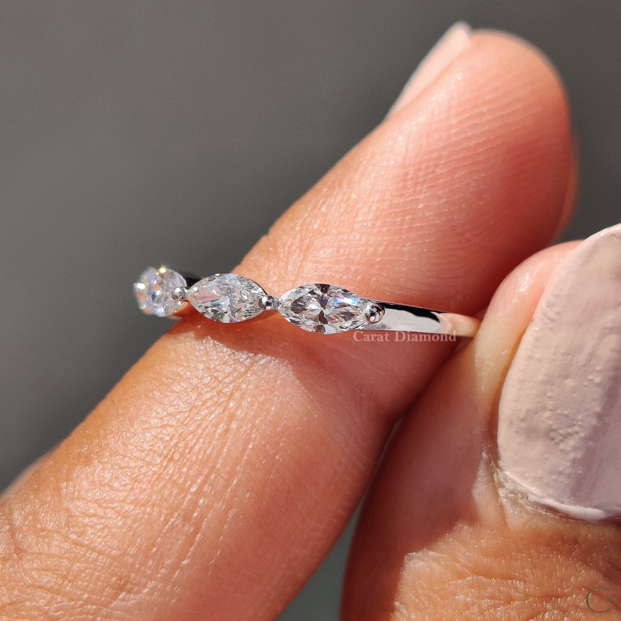 Half eternity wedding band with a seamless diamond design.
