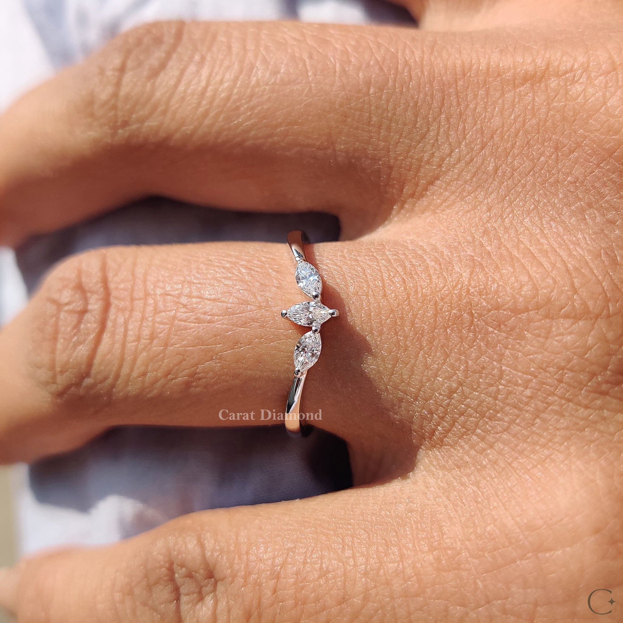 Simple wedding band crafted in white gold with lab grown diamonds.
