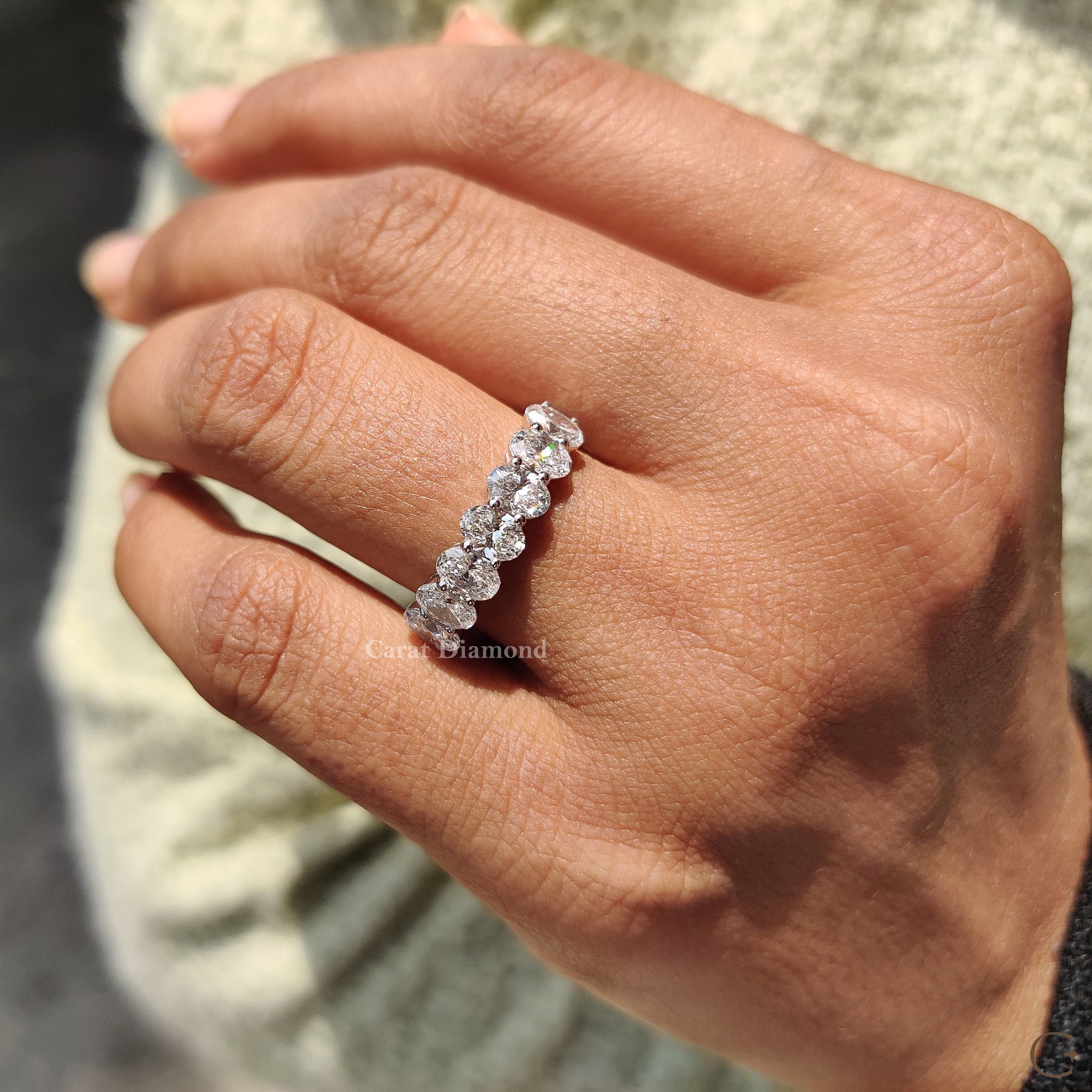 Handmade jewelry piece with oval cut diamonds.
