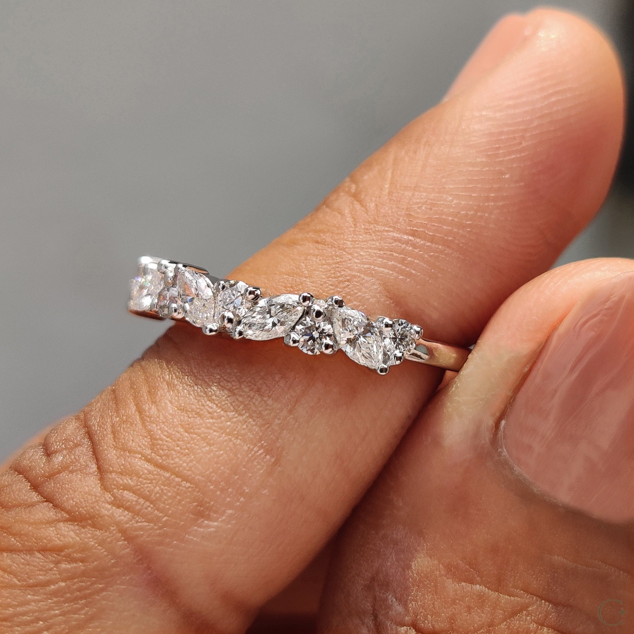 Half eternity diamond band with lab-grown diamonds.
