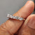 Half eternity diamond band with lab-grown diamonds.
