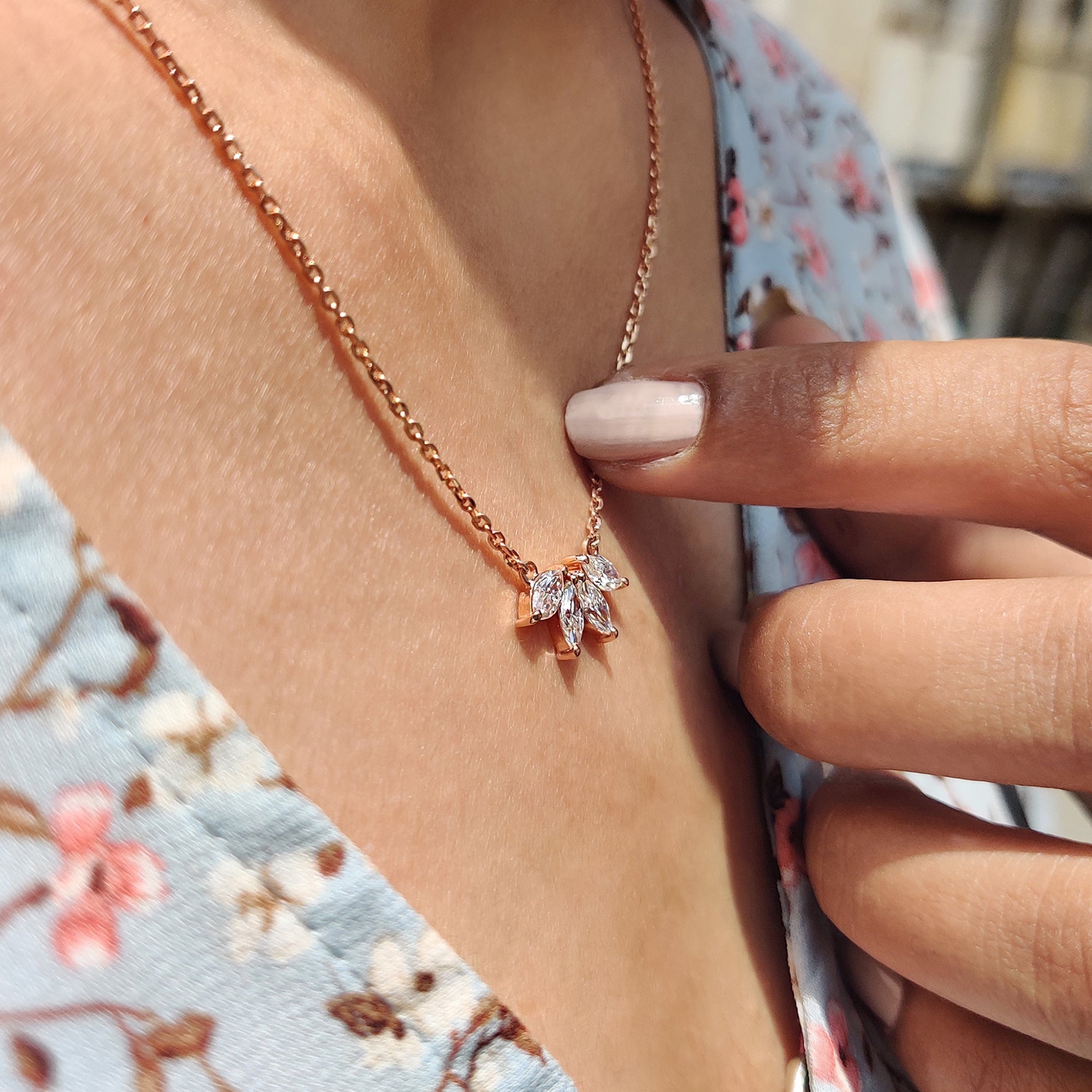 Pendant for women designed as Four Stone Pendant in Marquise Cut Moissanite Pendant.
