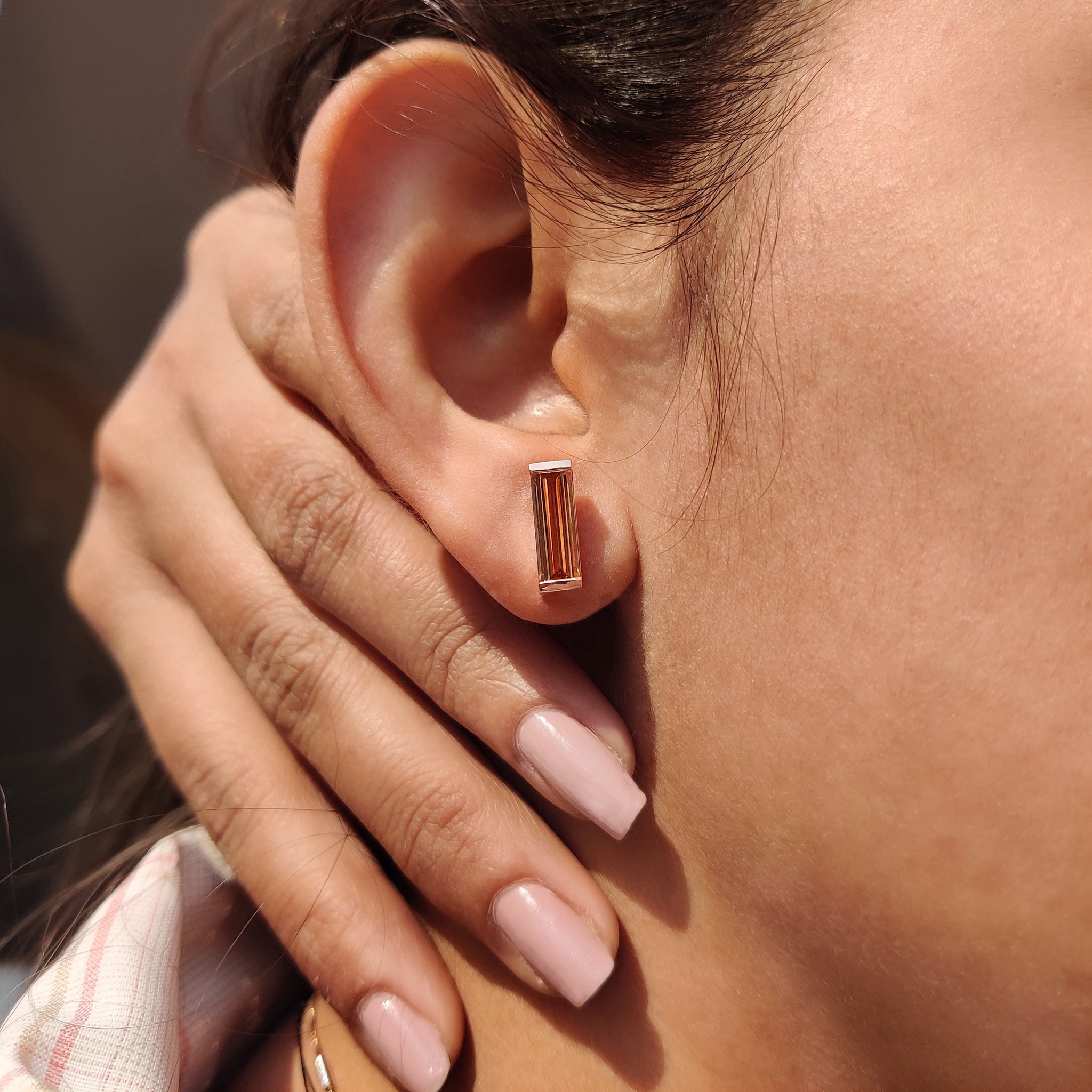 Moissanite Stud Earrings made using baguette cut earrings in Semi Bezel setting.
