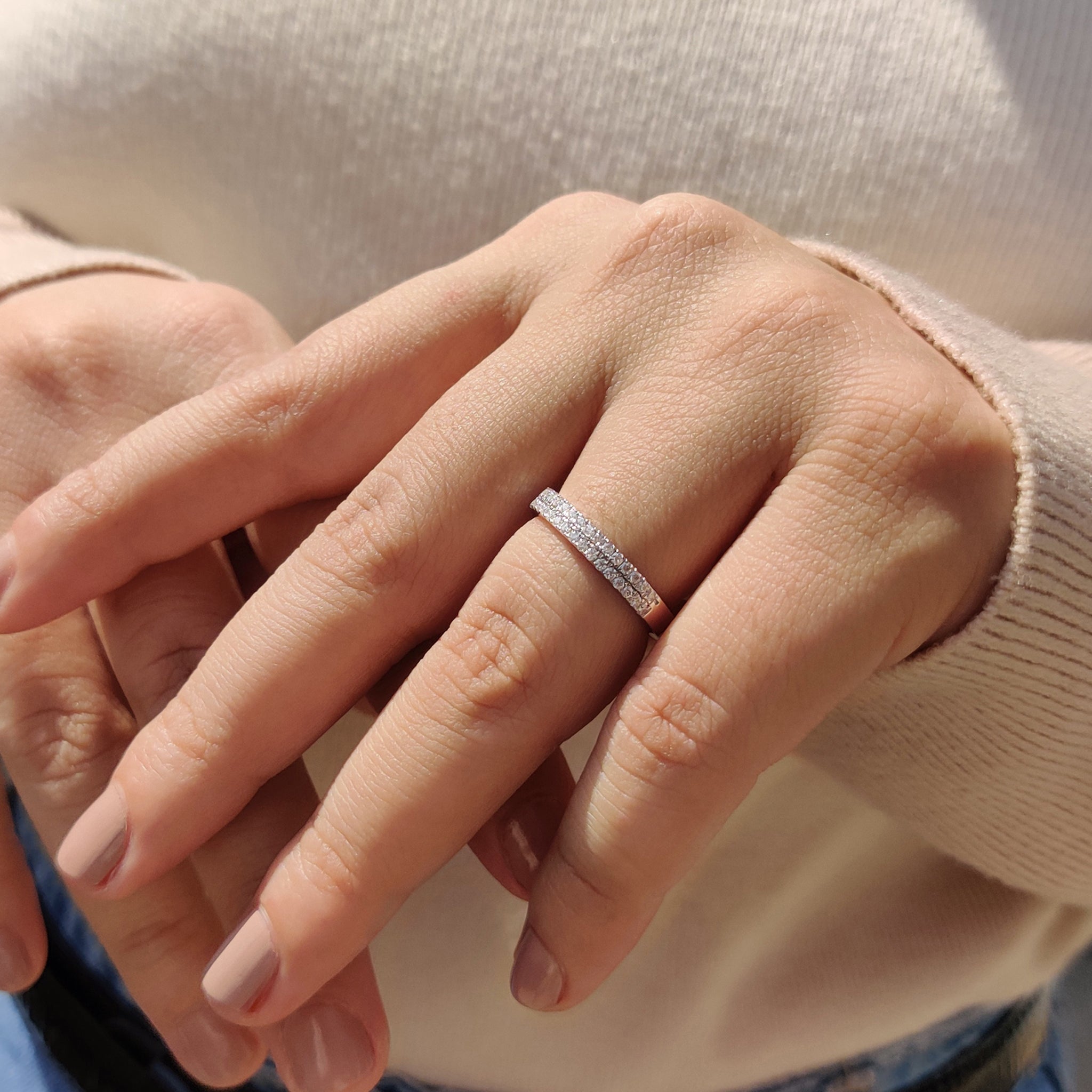 A moissanite wedding band that's simple and classy.