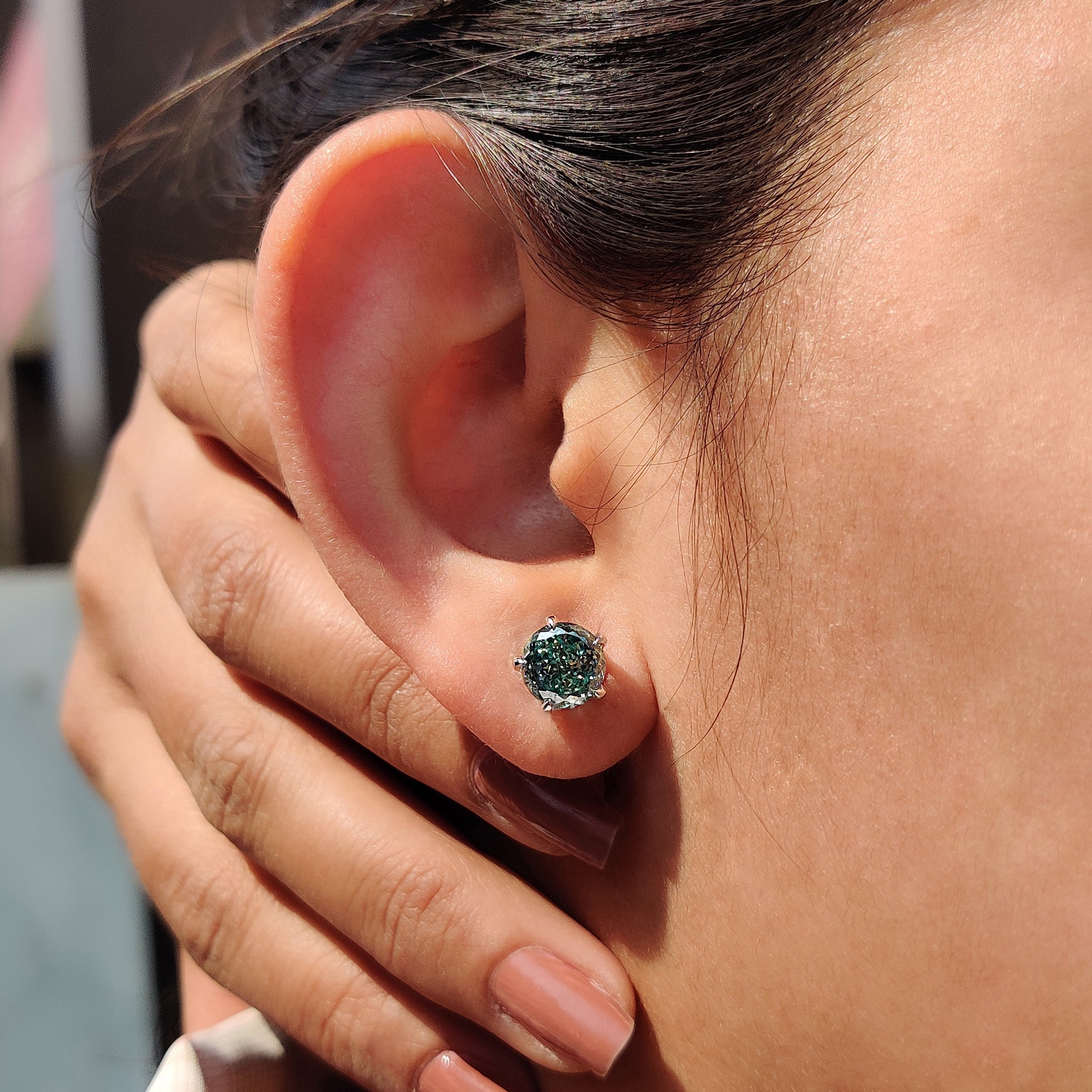 5 prong earring settings applied to moissanite stud earrings for secure fit and style.
