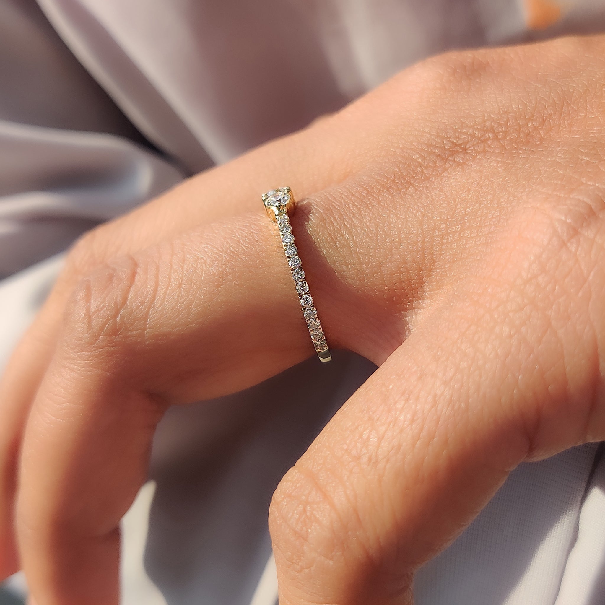 Minimalist diamond band for a subtle yet stunning look.
