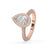 Teardrop diamond in a hidden halo pear engagement ring, showcasing a pave band and elegant diamond cathedral ring design.