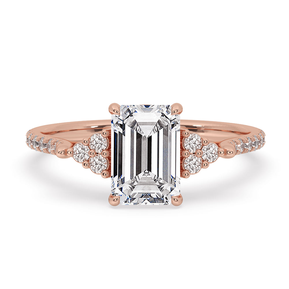 Emerald cut engagement ring diamond with claw prong setting, IGI certified.

