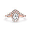Pear halo engagement ring featuring a stunning teardrop diamond and a delicate claw setting for a secure hold.