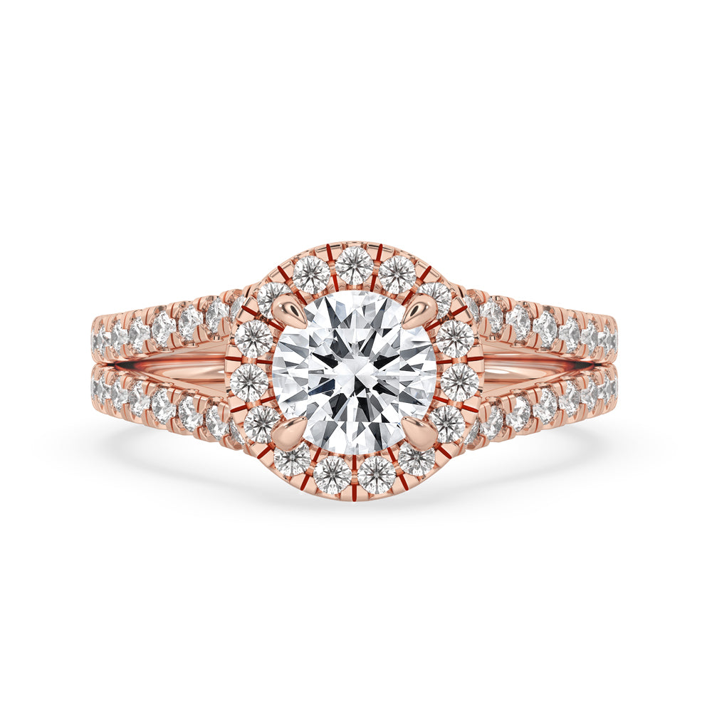 2 carat round diamond ring in a halo setting with split shank design.
