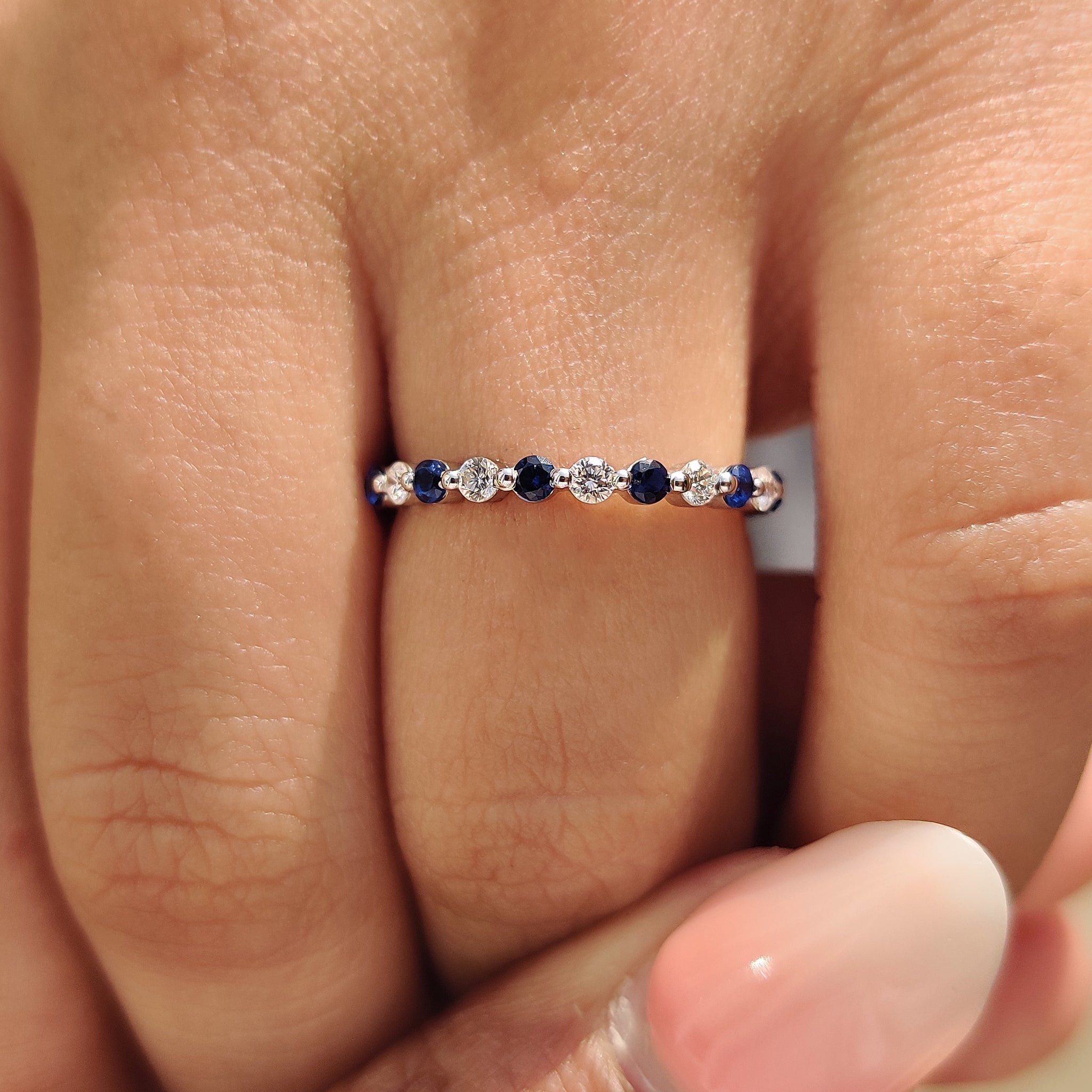 Beautiful shared prong wedding band with secure diamond settings.
