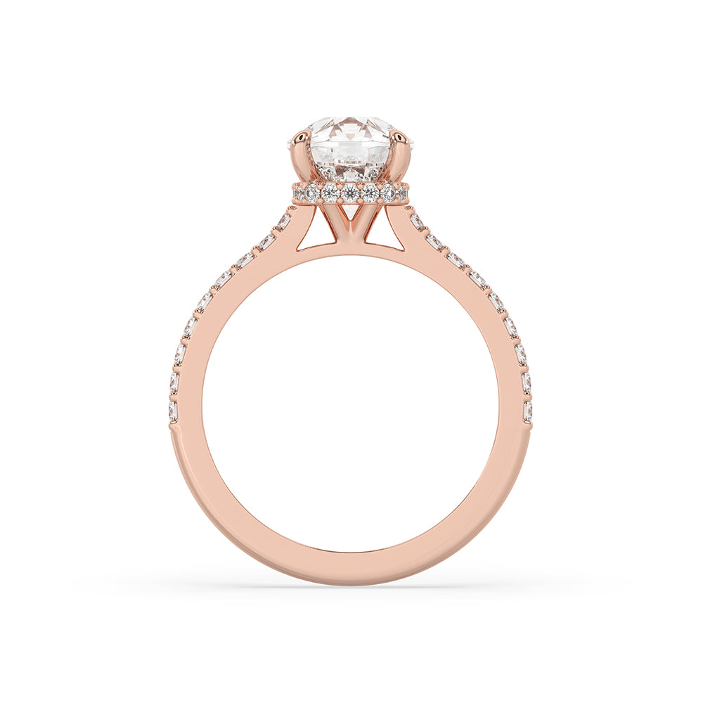 Handmade jewelry featuring a claw prong ring and a cushion cut ring design with IGI certified diamond.
